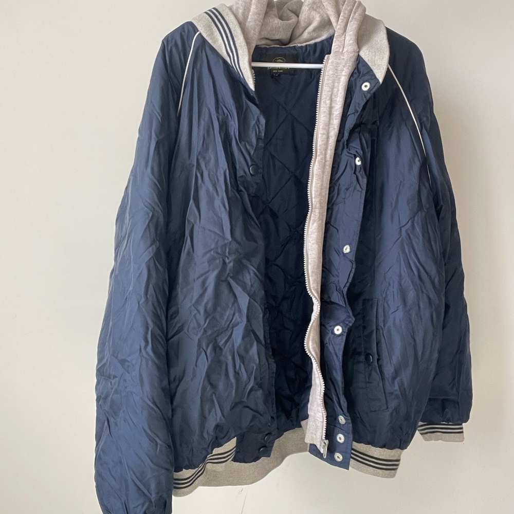 Red head cowboys windbreaker